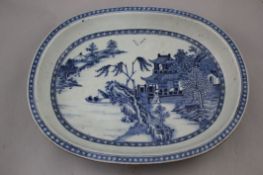 A Chinese export blue and white oblong dish, Qianlong period, painted to the centre with two figures