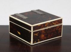 A late 19th century square tortoiseshell cigarette box, with ivory borders and silver strap