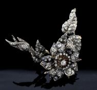 A Victorian gold, silver and diamond trembleuse brooch, of foliate form, set with old and rose cut