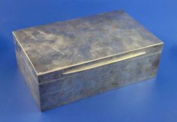 A late Victorian silver mounted cigarette box, of rectangular form, with later engraved inscription,