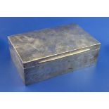 A late Victorian silver mounted cigarette box, of rectangular form, with later engraved inscription,