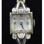 A lady's 1930's Art Deco 14ct white gold cocktail watch, with square Roman and dot marker dial