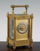 A late 19th century French ormolu hour repeating carriage clock, with blind fretwork decorated