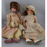 An Armand Marseille bisque headed doll, marked 246 Flora Dora, with sleeping eyes and jointed