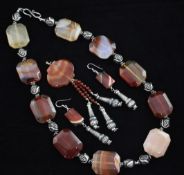 A silver mounted agate necklace, set with ten octagonal agates, with stylised silver links, 22in,