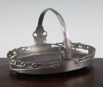 A Liberty Tudric pewter oval basket, no.0359, designed by Archibald Knox, with pierced gallery and