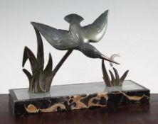 A French Art Deco patinated bronze model of a kingfisher, amongst reeded with fish in its mouth,
