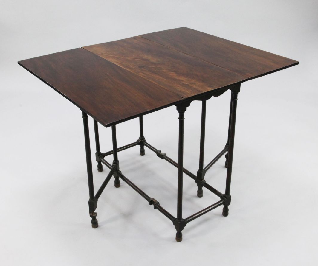 A George III mahogany drop leaf spider leg table, with turned underframe, extended W.3ft