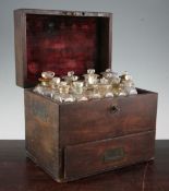A 19th century mahogany apothecary cabinet, the hinged lid opening to reveal a fitted interior