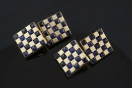 A pair of gold and sapphire set "chequered" cufflinks, of square form, each set with thirteen square