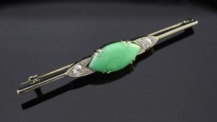 A 1930's 18ct gold and platinum, jadeite and diamond bar brooch, set with navette shaped jade