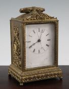 A 19th century French ormolu and pendule d'officier, the Roman dial with central seconds signed