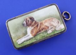 An Edwardian silver and enamel vesta case decorated with a recumbent St. Bernard, "Michael", by