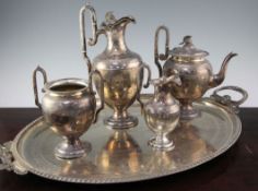 A Victorian four piece plated tea service and two handled tea tray by James Dixon & Sons, of