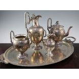 A Victorian four piece plated tea service and two handled tea tray by James Dixon & Sons, of