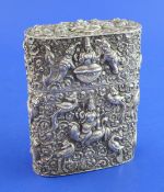 A large 19th century Indian silver cheroot case, of elliptical form, the interior with twelve