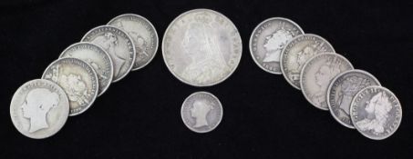 A Victoria 1887 half crown, a George III 1816 shilling and a George II 1757 sixpence, together