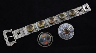 An early 20th century engraved Scottish silver and citrine bracelet, with buckle shaped clasp and