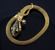 A 19th century style continental 14ct gold, black enamel and diamond set serpent bracelet, with leaf