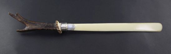 A Victorian ivory and horn handled silver mounted paper knife, retailed by Rowland Ward & Co, 166