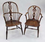 A 19th century elm seat Windsor wheelback armchair, together with a similar smaller Windsor armchair