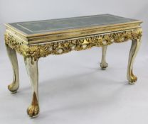 An early 20th century white painted and parcel gilt chinoiserie side table, the top decorated to