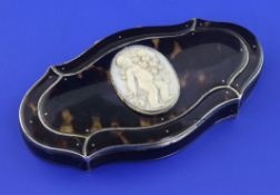 A late 19th/early 20th century Swiss? tortoiseshell mounted silver trinket box, of shaped oval form,