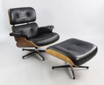 A black leather and rosewood veneered 670/671 lounge chair and matching ottoman, after a design by