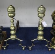 A pair of early 19th century American Federal brass and wrought iron andirons, in the manner of John