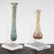 Two Roman glass unguentarium, c.2nd century A.D., both with everted rims, the first of spearmint