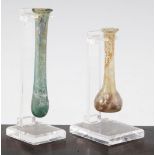 Two Roman glass unguentarium, c.2nd century A.D., both with everted rims, the first of spearmint