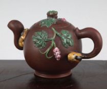 A Chinese Yixing enamelled pottery teapot, 20th century, applied with figures of squirrels and