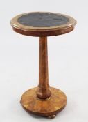 A Victorian pollard oak circular occasional table, with inset leather top, on tapering octagonal