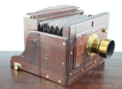 A Victorian mahogany plate camera, with a brass J H Dallmeyer lens, London 5635, unmarked, 9.5in.
