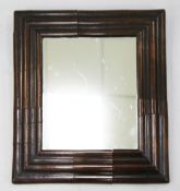 A late 17th century style walnut cushion framed mirror, with square mirror glass plate, W.1ft 10.