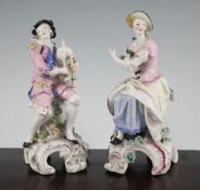A pair of Chelsea-Derby figures of musicians, c.1775, each modelled seated on a tree stump and a