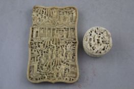 A Chinese export ivory card case and a similar circular box containing mother of pearl counters,