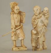 Three Japanese ivory groups of figures, early 20th century, comprising a standing figure of a man