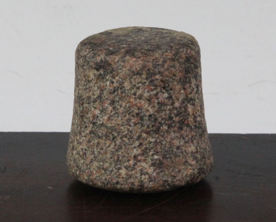 An Egyptian granite pestle, New Kingdom, 5cm