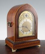 An Edwardian inlaid rosewood mantel clock, with lancet case and gilt brass dial, W & H movement