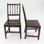 A set of six George III country oak dining chairs, with reeded splats, on square section supports