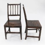A set of six George III country oak dining chairs, with reeded splats, on square section supports