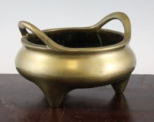 A large Chinese bronze ding shaped censer, Xuande six character mark, probably 18th century, the