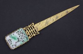A Chinese jadeite mounted gilt bronze paper knife, the 19th century jadeite plaque pierced and
