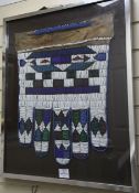 A South African ndebele beadwork jocolo or bride's apron, 20th century, framed and glazed, overall