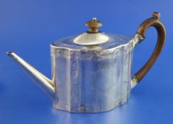 A George III silver teapot, of quatrefoil shape, with engraved decoration, Cornelius Bland,