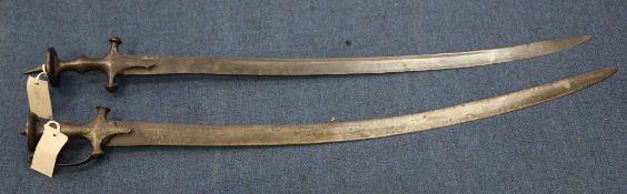 An Indian tulwar, with 29.5 inch blade, together with another similar tulwar