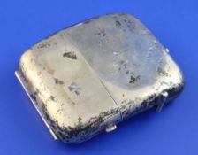An Edwardian silver combination cigarette case and hip flask, of concave form, with two lidded