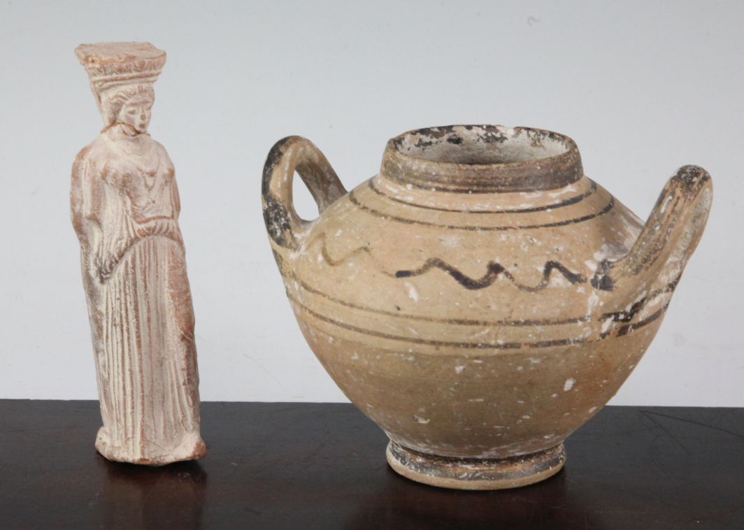 A Mycenaean two-handed jar, c.5th century B.C. and a Athenian Kore figure, c. 300 B.C., 10.5 and