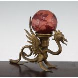 A Galle cameo glass shade, with a brass 'dragon' lamp base, c.1910, the globular shade with pink